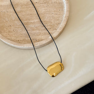 Gold Signet Yarn Necklace
